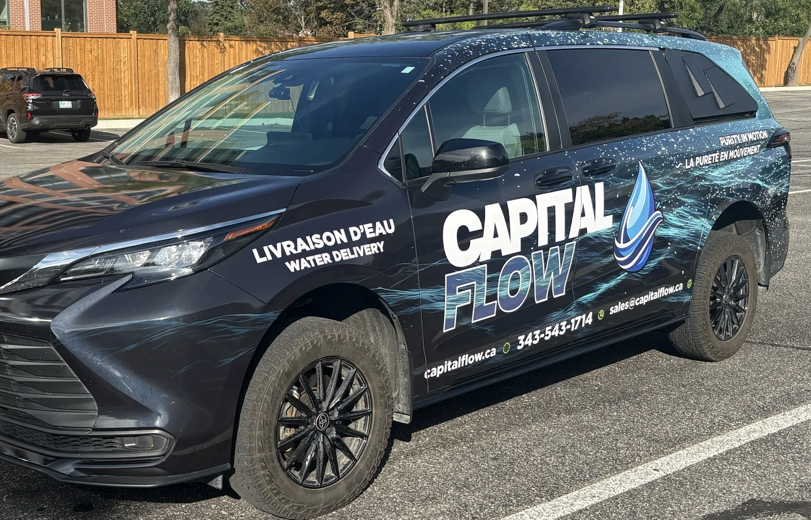 Capital Flow wrapped water-delivery van in Ottawa